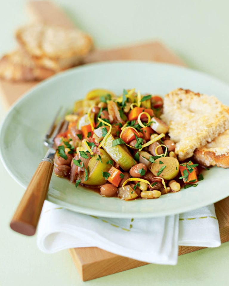 Garlicky vegetable, bean and herb pot with parmesan toasts