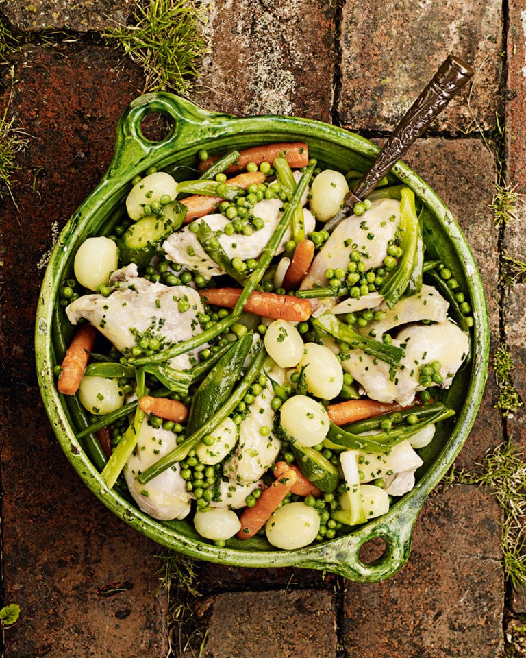 Poached chicken with summer vegetables and chive butter sauce