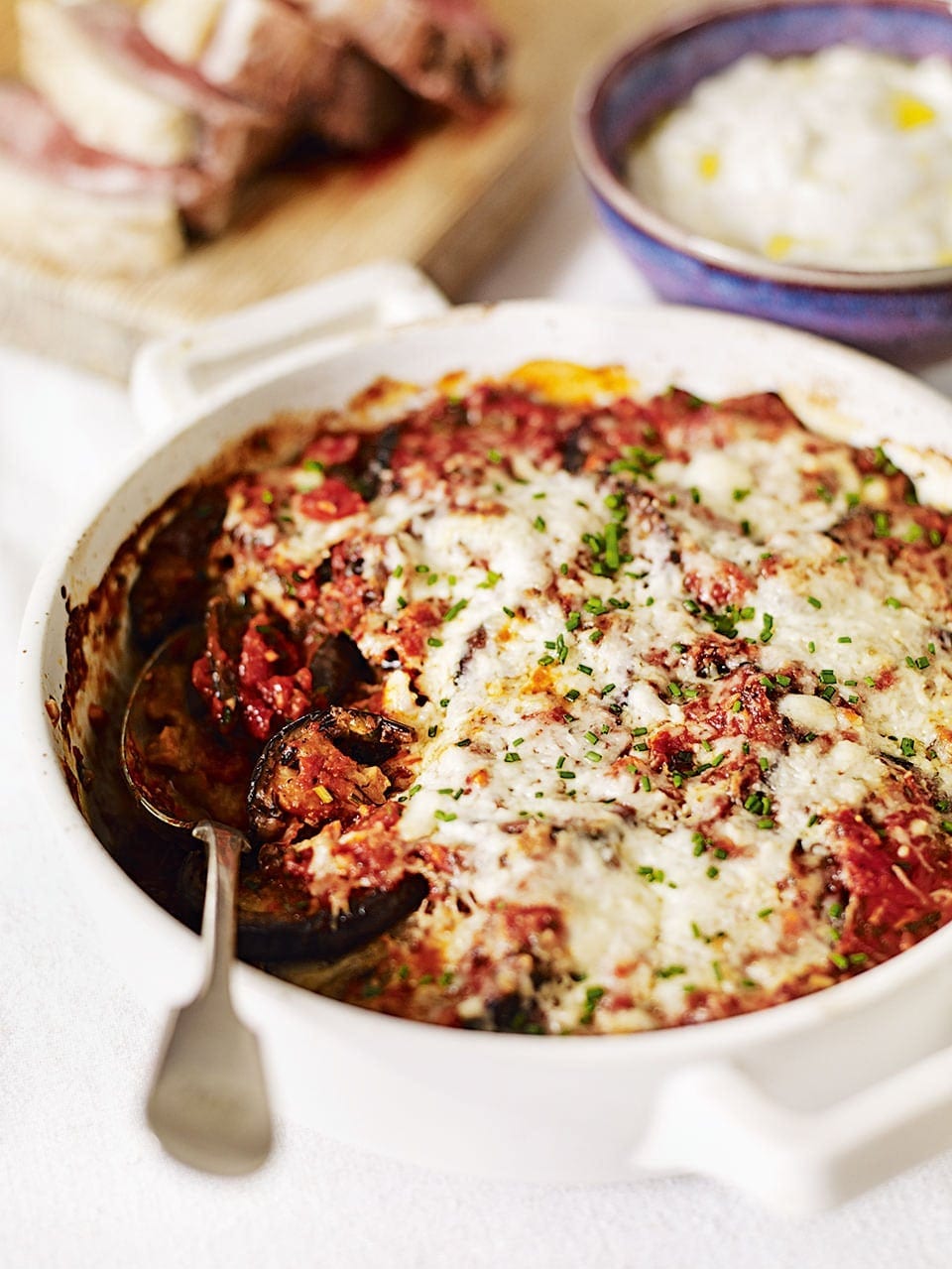 Rack of lamb with an aubergine and cheese bake | delicious. magazine