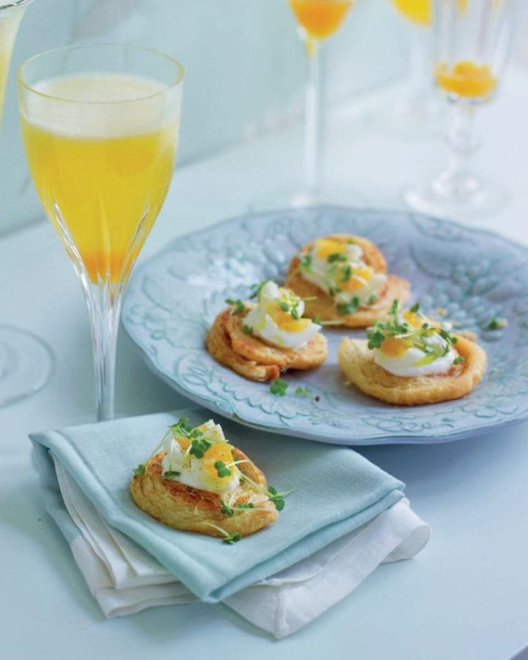 Cheese swirls with quail’s eggs and cress