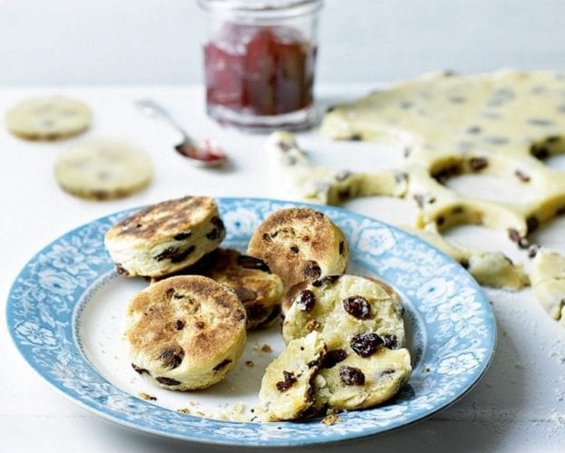 Singing hinnies shown baked and crumbled apart on a blue plate
