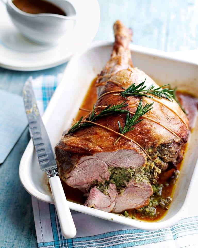 Roast leg of lamb stuffed with herbs, macadamia nuts and lemon