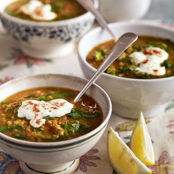 Middle Easternspiced spinach and lentil soup with garlic yogurt