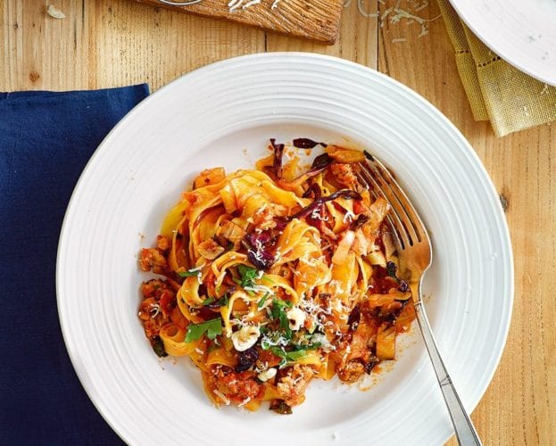 Tagliatelle with sausage ragù, radicchio and hazelnuts