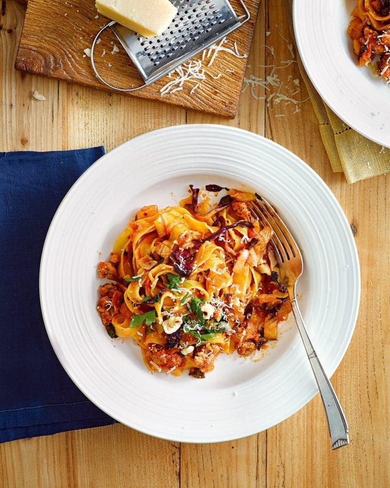 Tagliatelle with sausage ragù, radicchio and hazelnuts