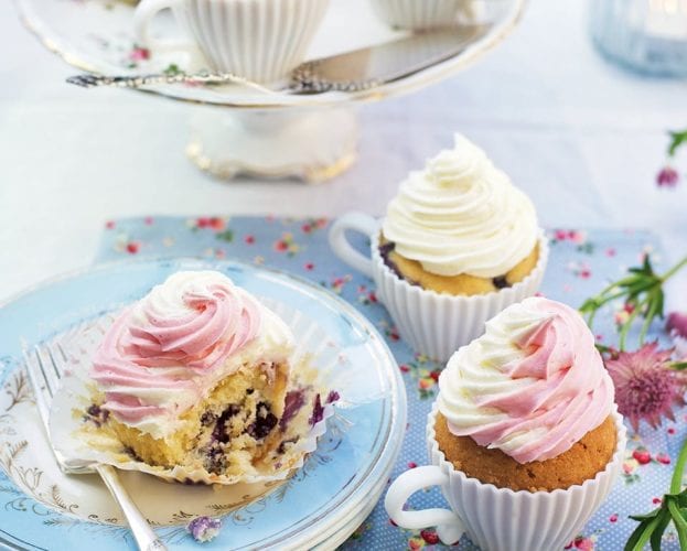 image of cupcakes with pink and white frosting
