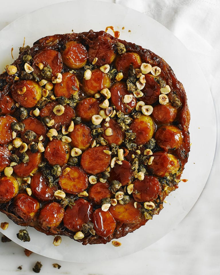 New potato and onion tarte tatin with crispy capers and hazelnuts