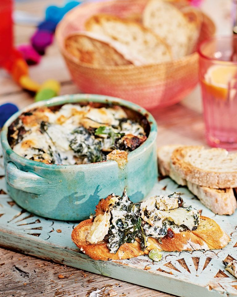 Cheesy spinach and artichoke dip delicious. magazine