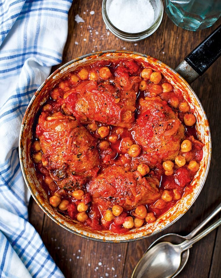 Tomatobraised chicken with chickpeas delicious. magazine