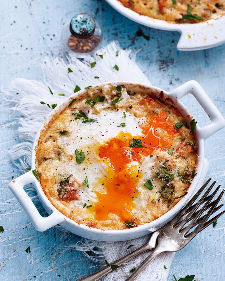 Baked eggs with hot-smoked salmon and herbs