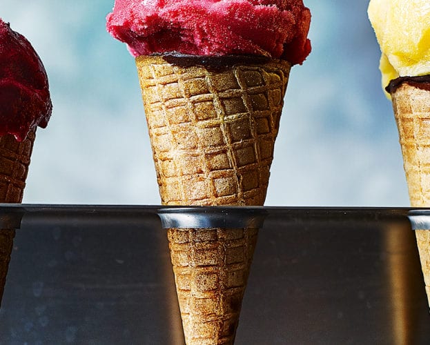Raspberry sorbet shown in a cone