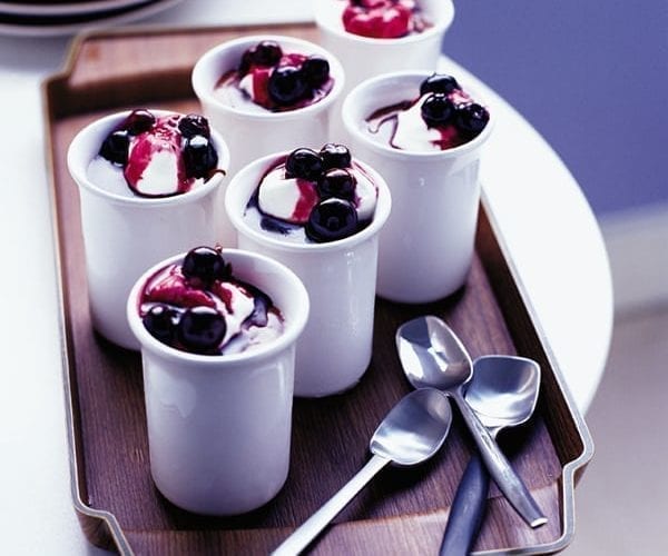 Chocolate fudge pots with blueberries in cassis