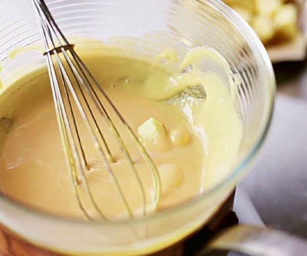 hollandaise sauce in a glass bowl