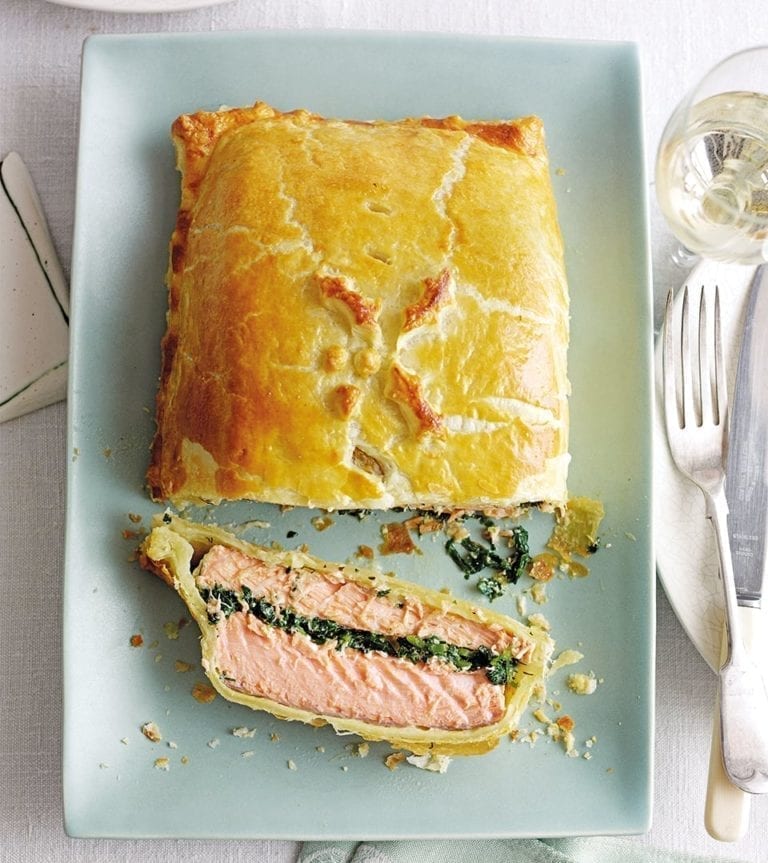 Salmon en croûte, sliced on a plate