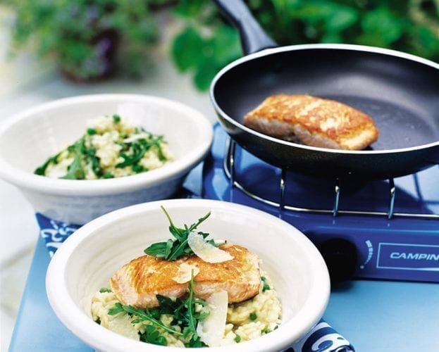Lemony pea and rocket risotto with salmon steaks