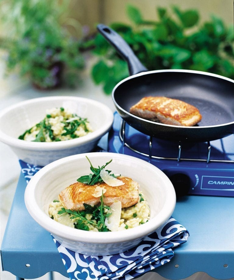 Lemony pea and rocket risotto with salmon steaks