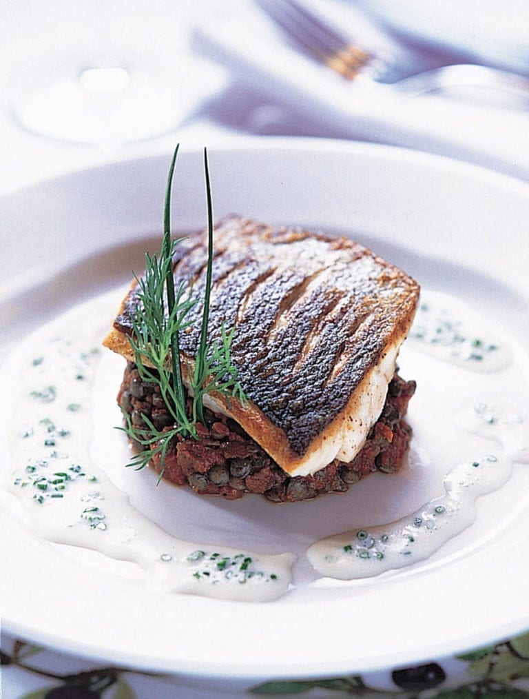 Fillets of sea bass on provençal lentils