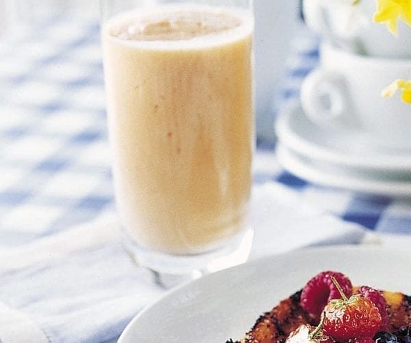 Papaya and banana smoothie in a glass