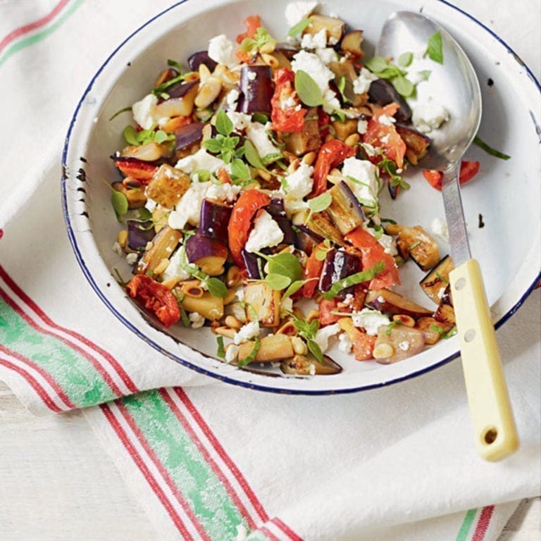 Sautéed aubergines with feta and pine nuts