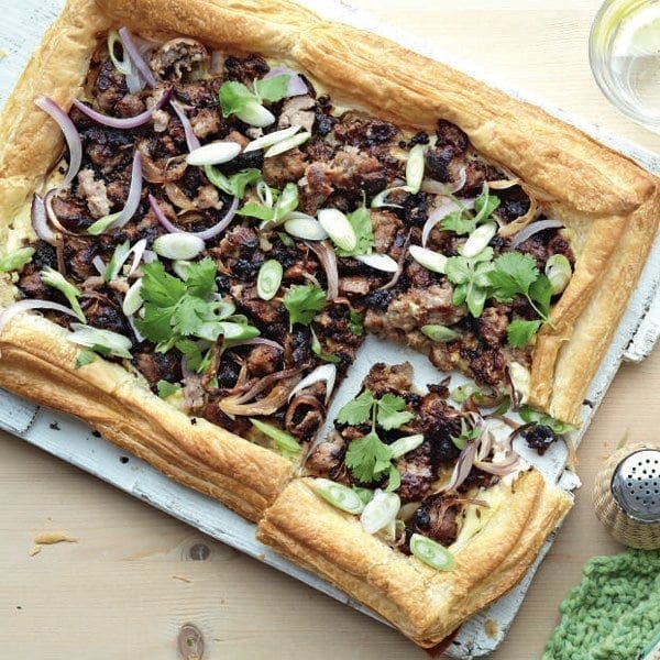 Spiced sausage and red onion tart