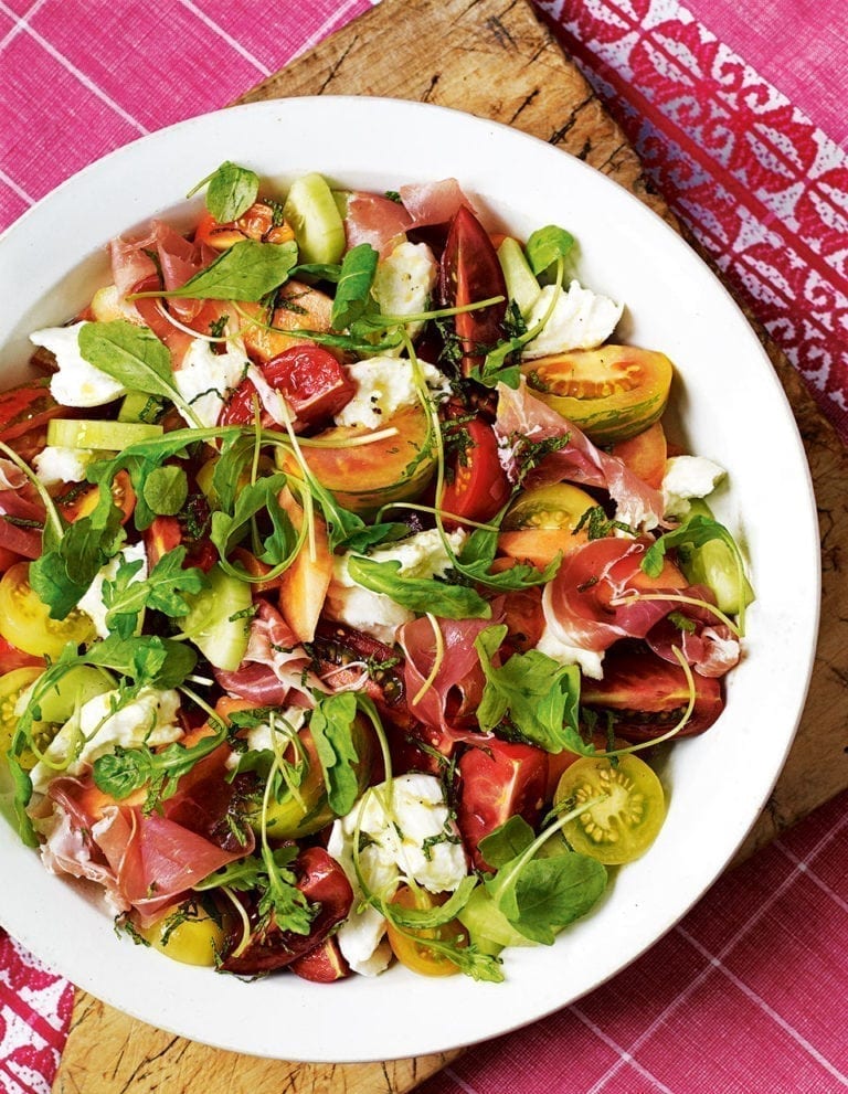 Heritage tomato salad with air dried ham, melon and mozzarella