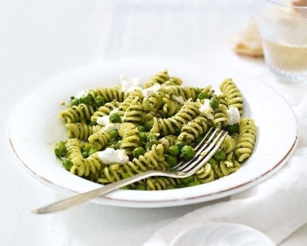 Walnut pesto pasta with peas and goat’s cheese