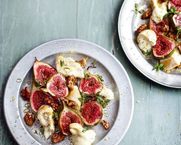 Baked figs on a grey plate