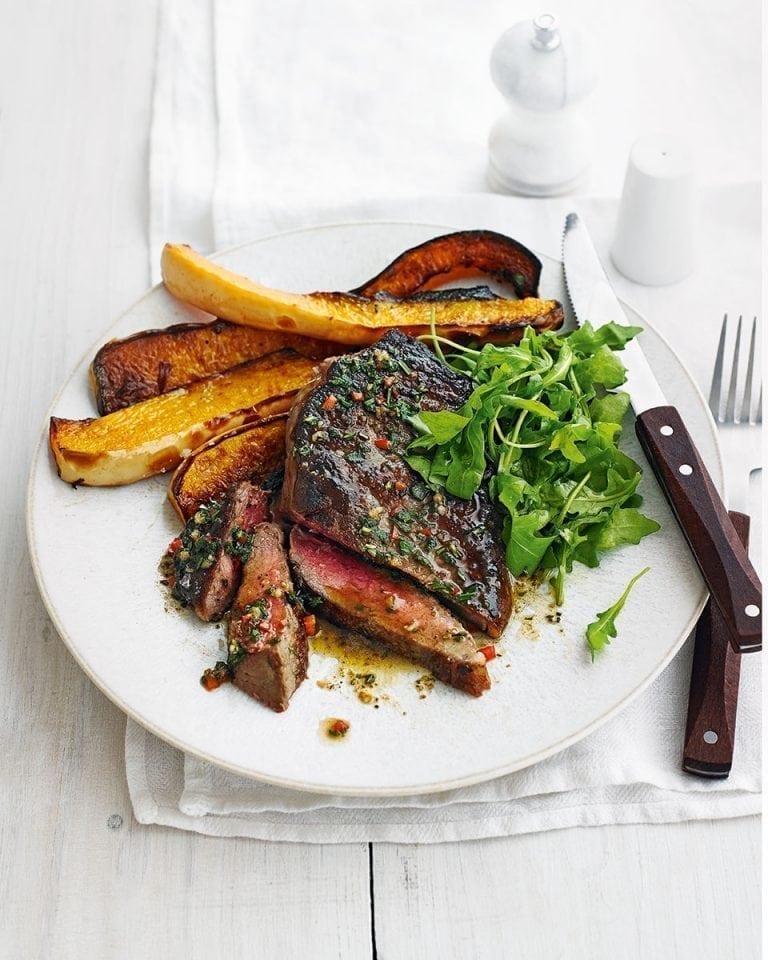 Sirloin steaks with roast squash and herb butter recipe | delicious. magazine