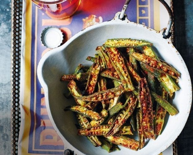 Bhinda fries (crispy okra chips) shown in a white bowl on a table