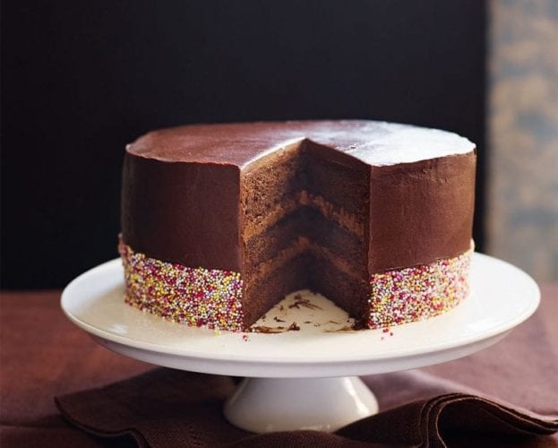 Layered chocolate cake with hundreds and thousands decoration