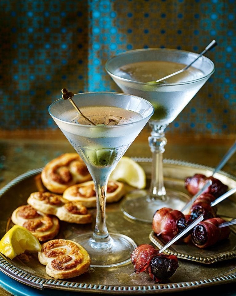 Olive-garnished martini