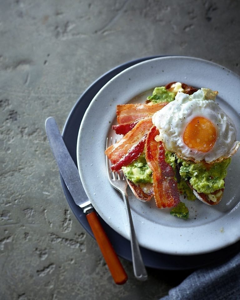 Avocado, bacon and fried egg on toast