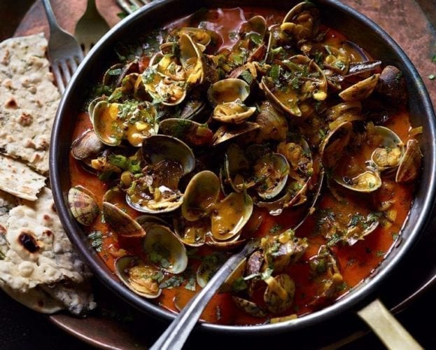 Keralan-style clams with herb-stuffed chapatis