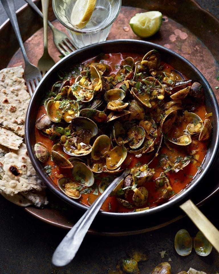 Keralan-style clams with herb-stuffed chapatis