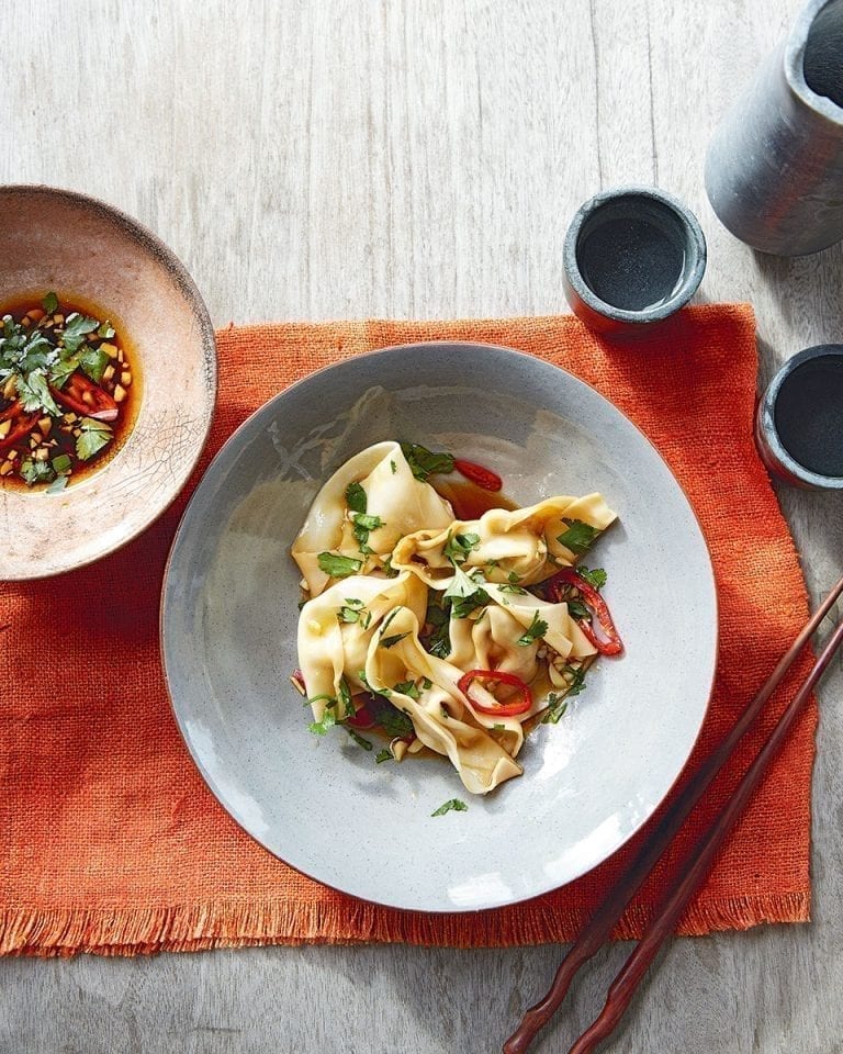 Poached wontons in chilli-garlic sauce