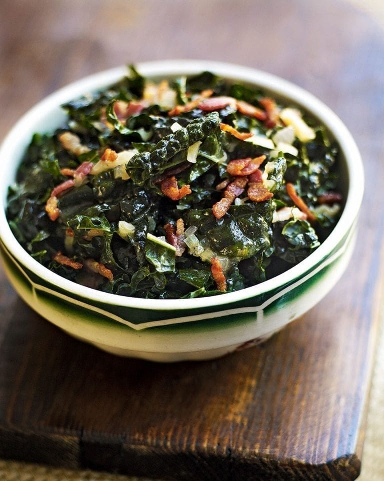 Winter greens with a hot bacon and mustard dressing