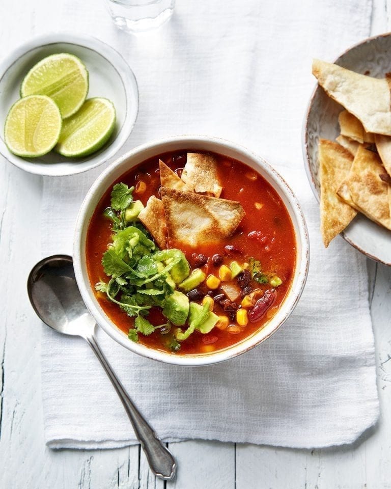 Spicy Mexican tortilla soup with avocado salsa