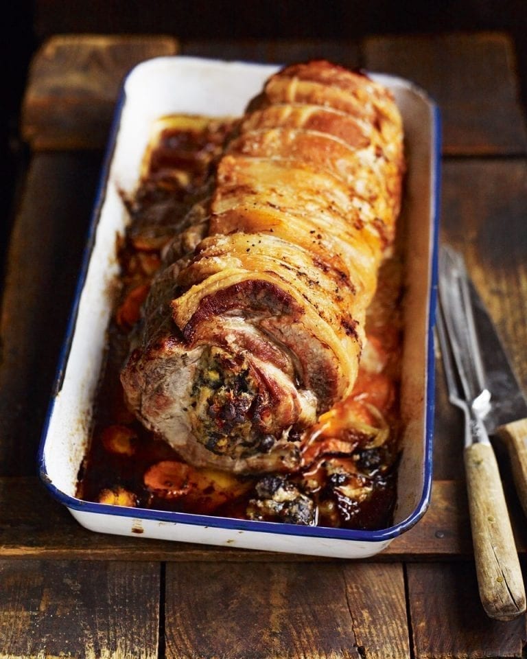 Roast loin of pork with black pudding stuffing and cider gravy