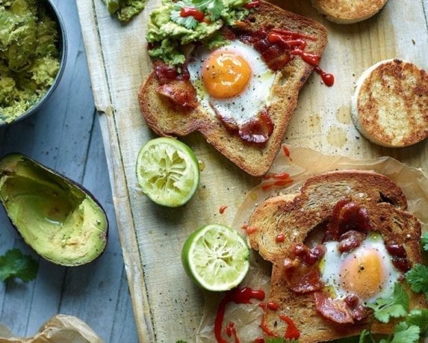 Pesto eggs with sourdough, avocado and bacon