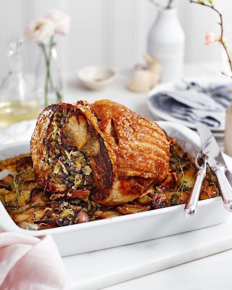 Almond and herb stuffed leg of pork with confit potatoes, apples and madeira recipe | delicious. mag