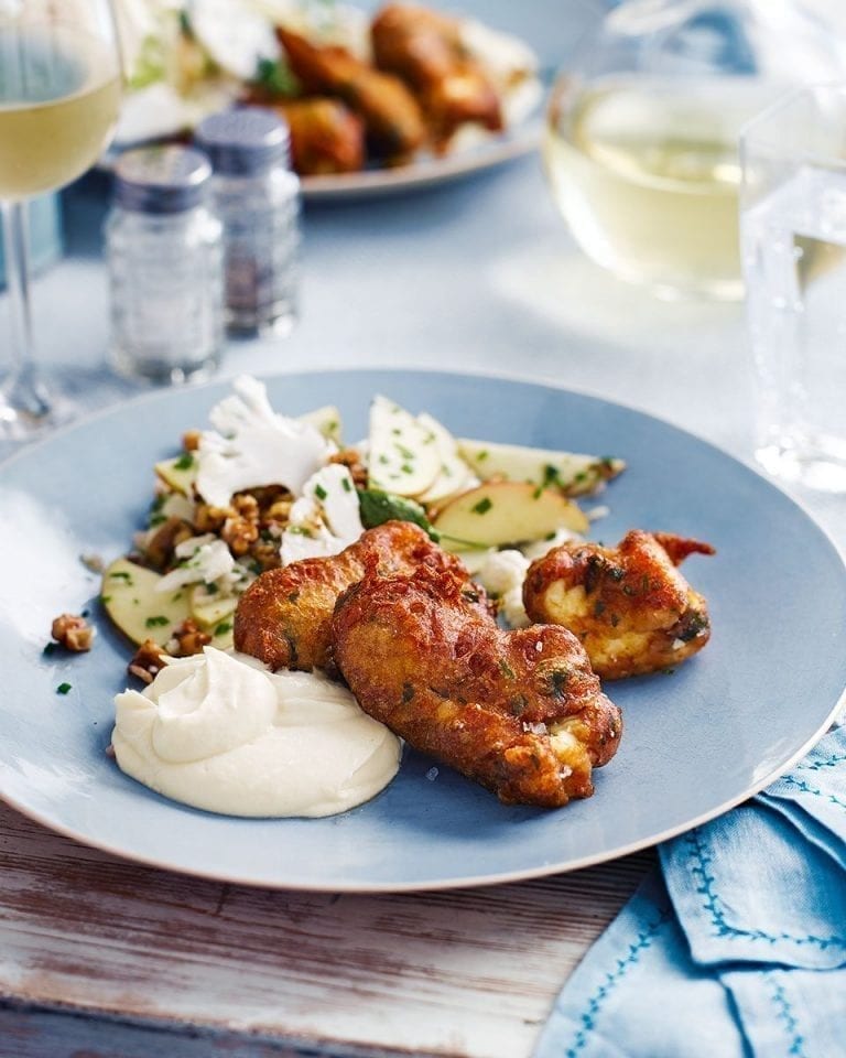 Crispy hake with cauliflower purée, apples and walnuts