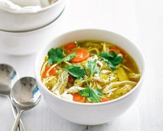 Quick chicken noodle soup in a white bowl