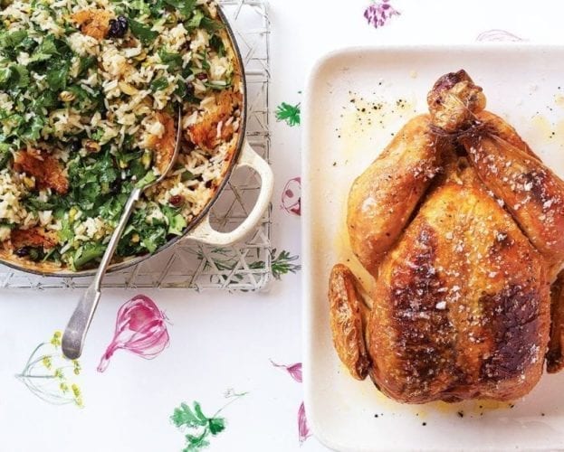 Garlic-stuffed chicken with pistachio, sour cherry and herb pilaf