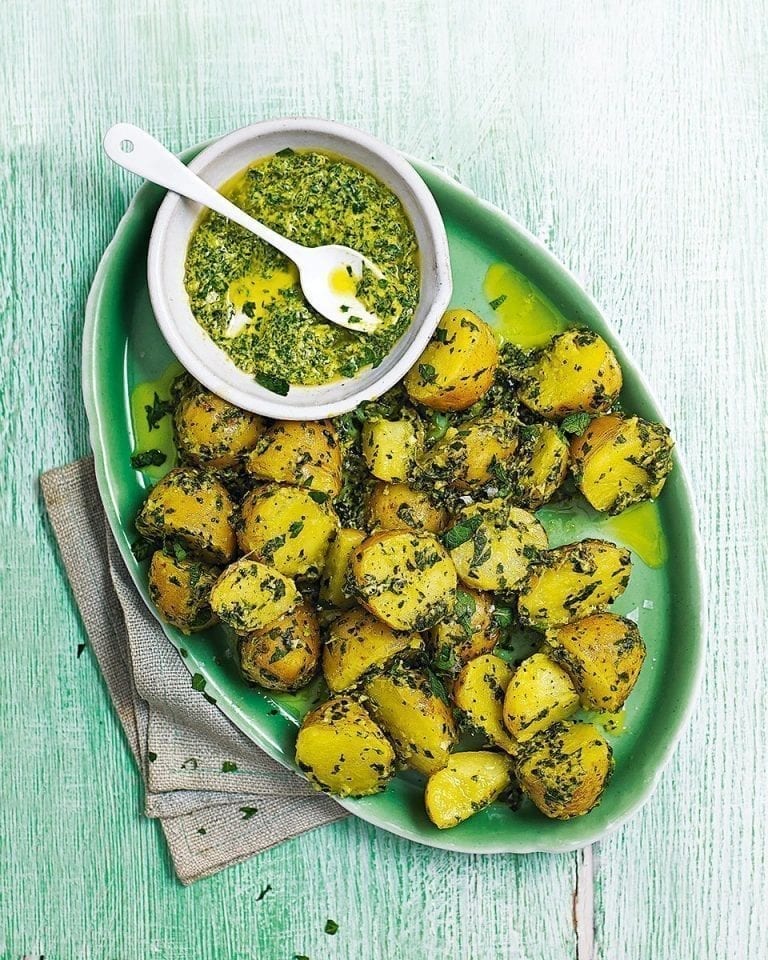 Warm potato salad with green tahini and herb dressing