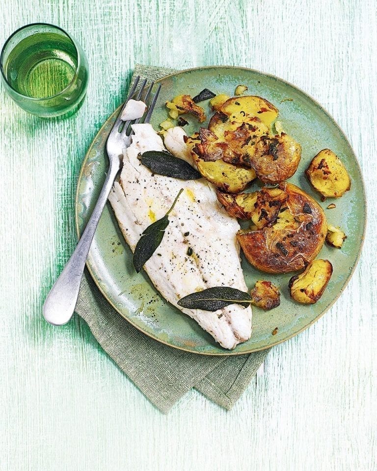 Garlic and sage smashed jersey royals with pan-fried sea bass