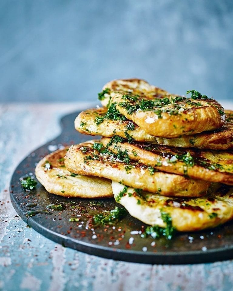 Warm flatbreads with herb butter