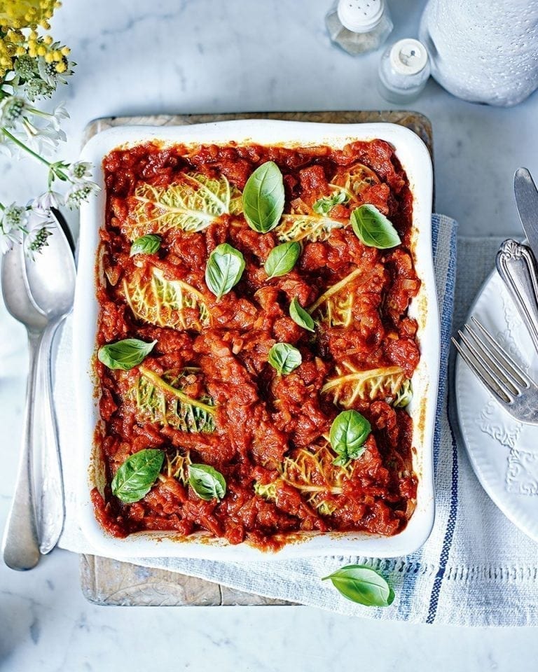 Stuffed cabbage rolls with tomato sauce recipe | delicious. magazine