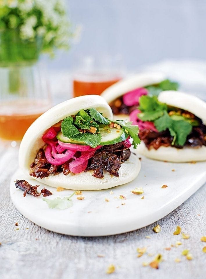 Bao buns with orange and pomegranate glazed lamb