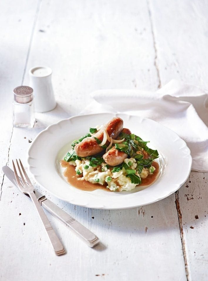 Quick bangers in red wine with greens and pea colcannon