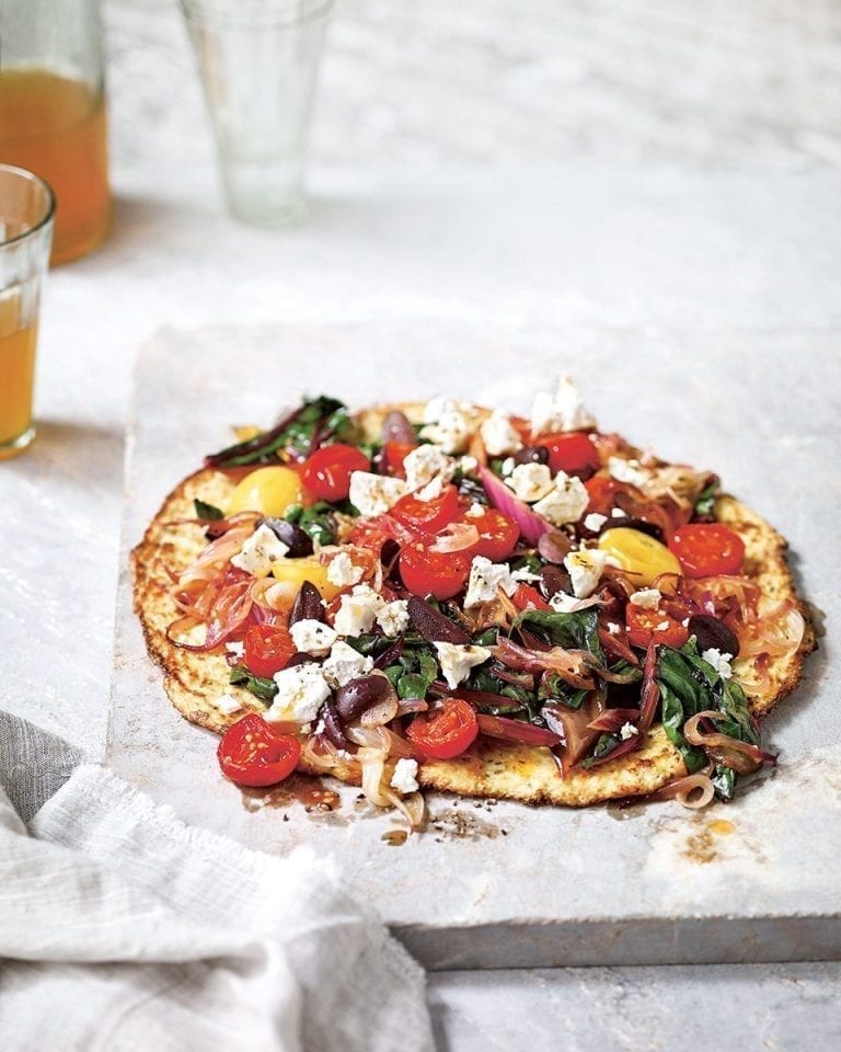 Grain-free cauliflower ‘pizza’ with chard and olives